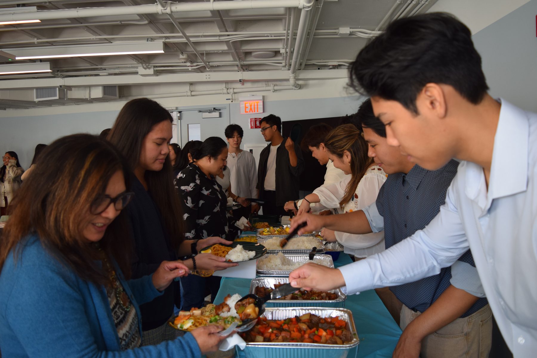 Attendees at the Filipino Community Conference buffet