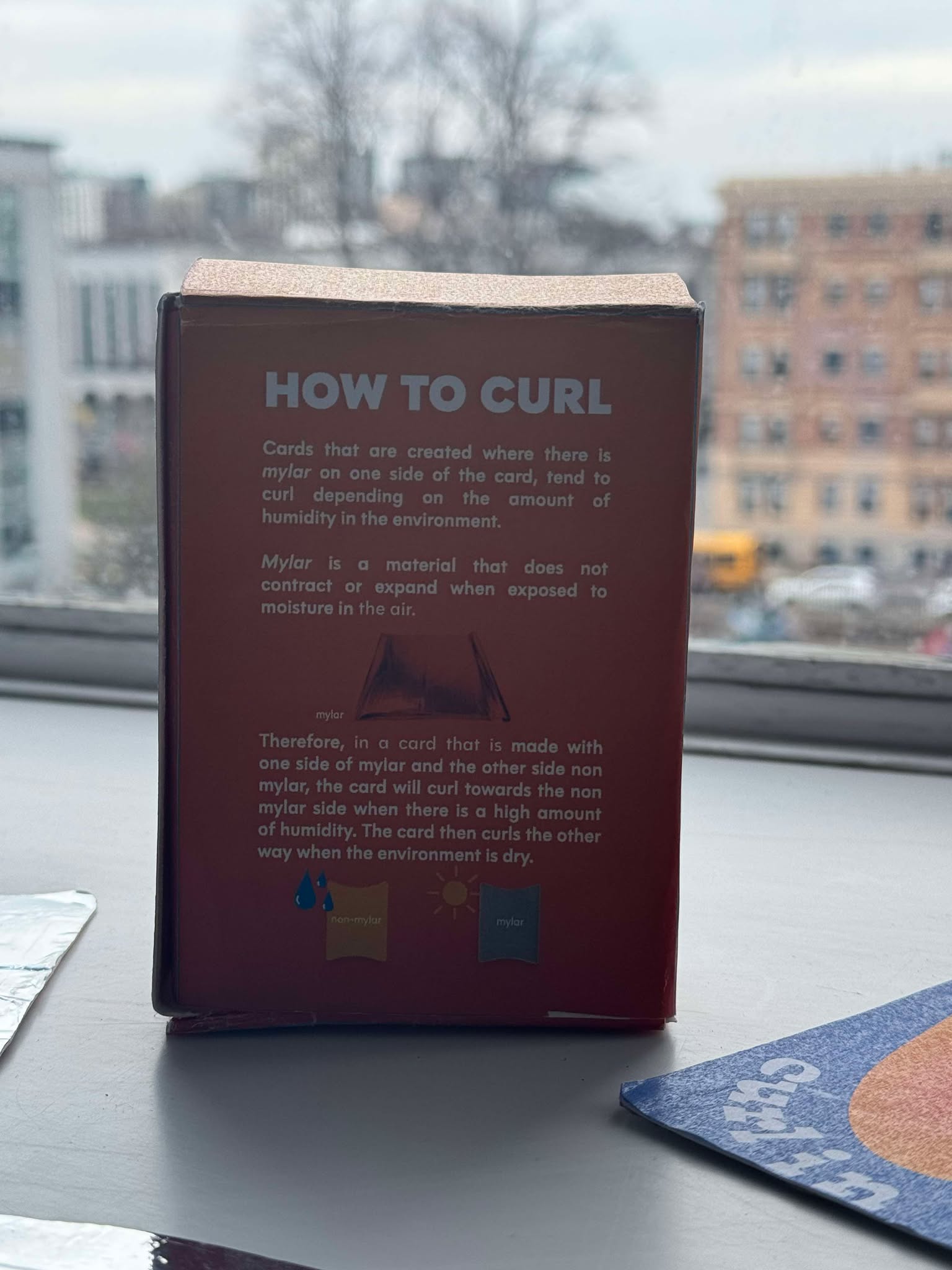 Box back with How To Curl guide