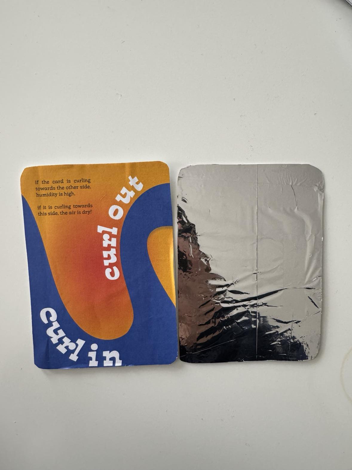 Card front and mylar back side by side