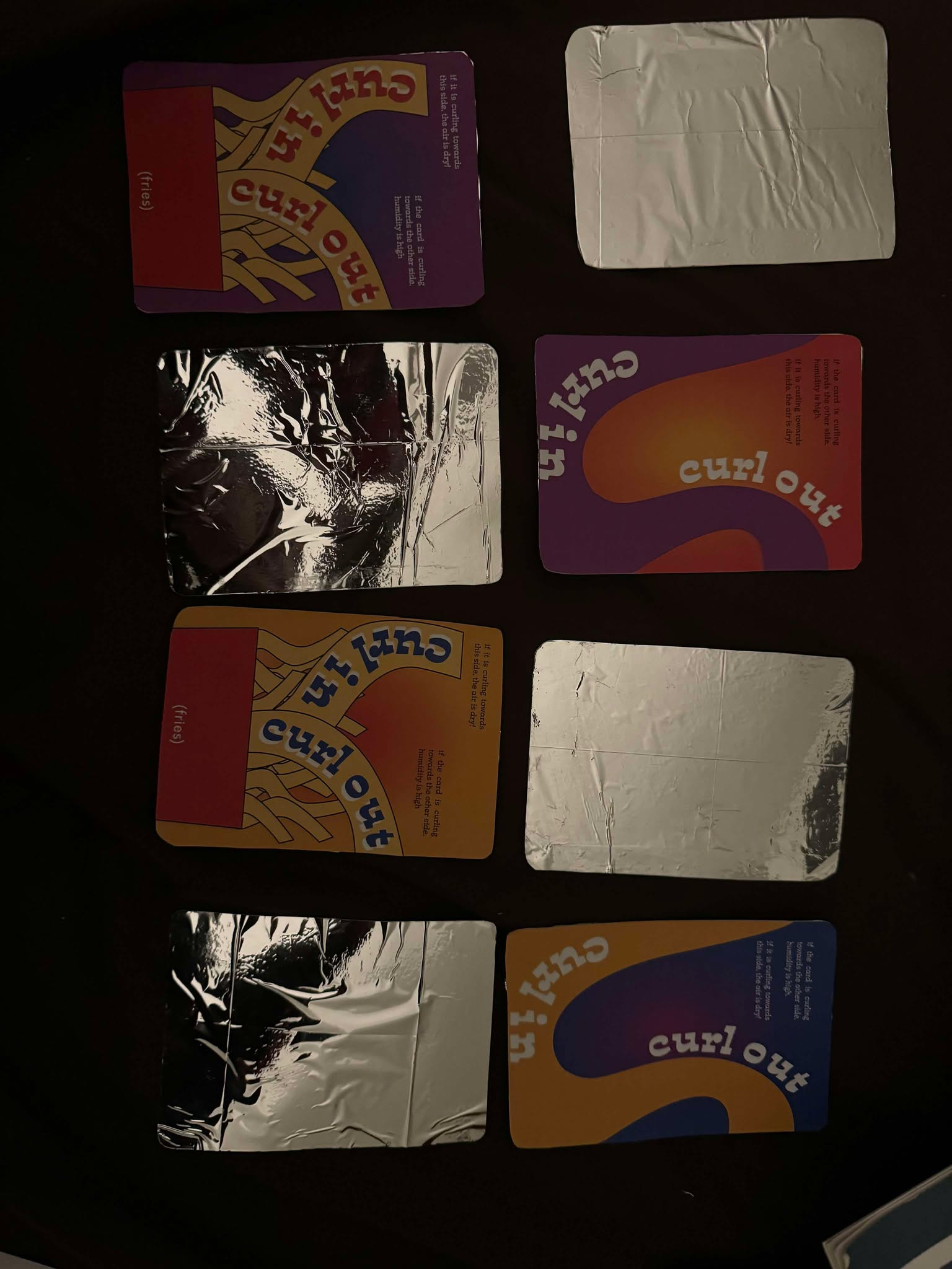 Cards spread on dark surface
