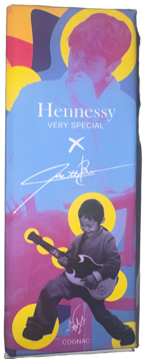 The printed Hennessy box held in hand, front panel